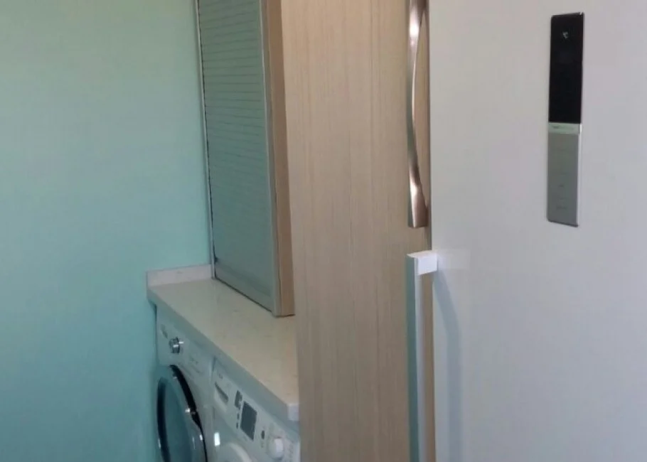 Cocina en L con lavadero independiente